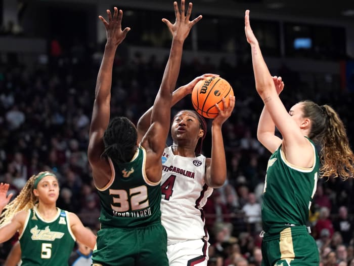 South Carolina forward Aliyah Boston shoots against South Florida forward Dulcy Fankam Mendjiadeu during the second round of the NCAA women’s tournament.